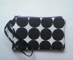 CLEARANCE***black/white polka dots purple zipper and lining 